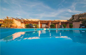 Beautiful home in Trinità d'Agultu with WiFi, Outdoor swimming pool and 3 Bedrooms